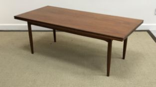 A 1960's Scandinavian (probably Danish) teak coffee table of rectangular form,