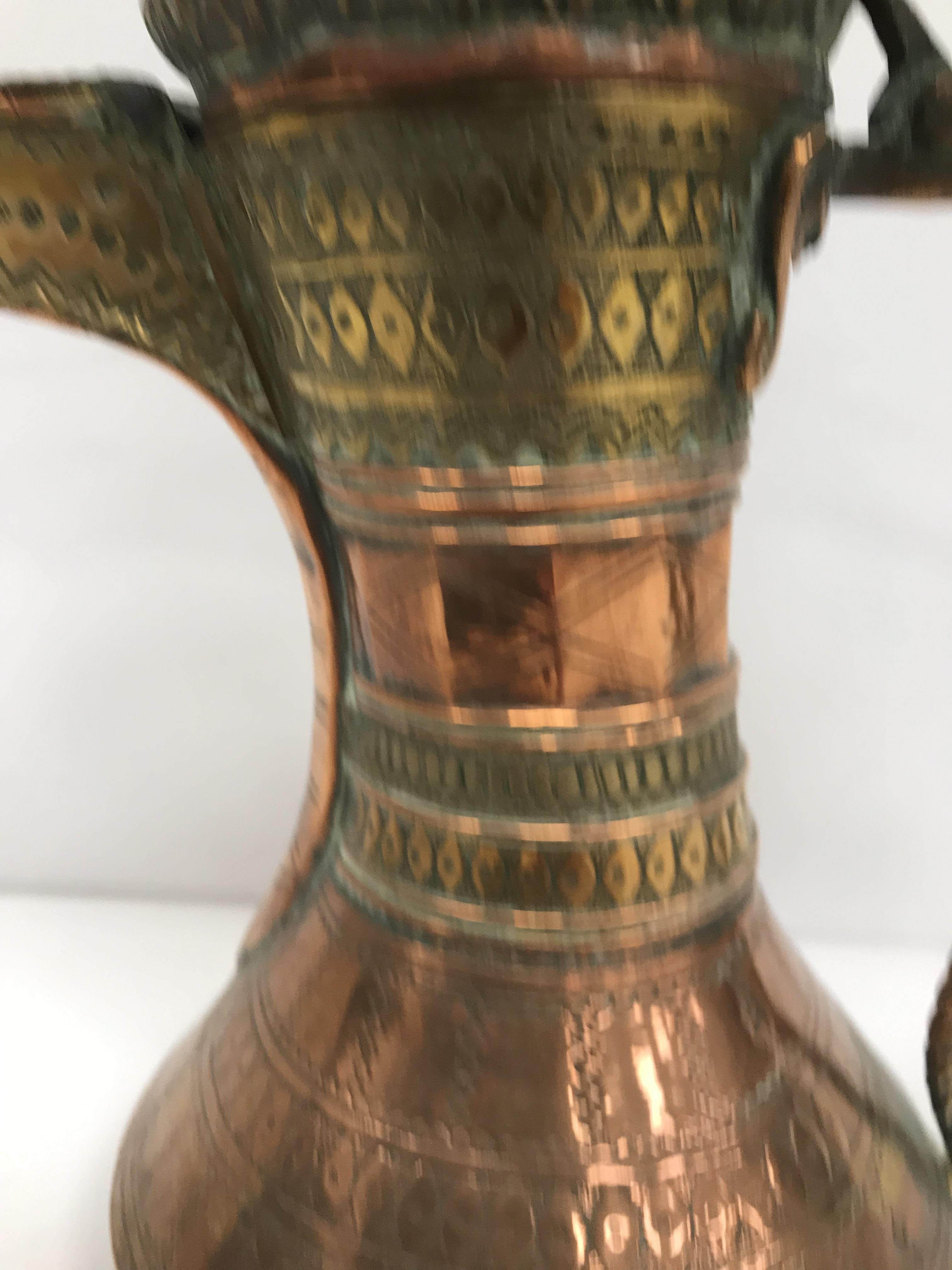 A collection of Middle Eastern and other copper wares to include two Turkish coffee pots, - Image 65 of 115