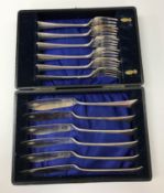 A box of assorted plated wares to include table lighters, muffin dish,