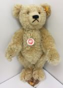 A Steiff Classic 1920 teddy bear, gold plush with hump back and growler approx.