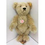 A Steiff Classic 1920 teddy bear, gold plush with hump back and growler approx.