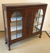 A Victorian mahogany centre table on turned and ringed twin end pillar supports united by a centre