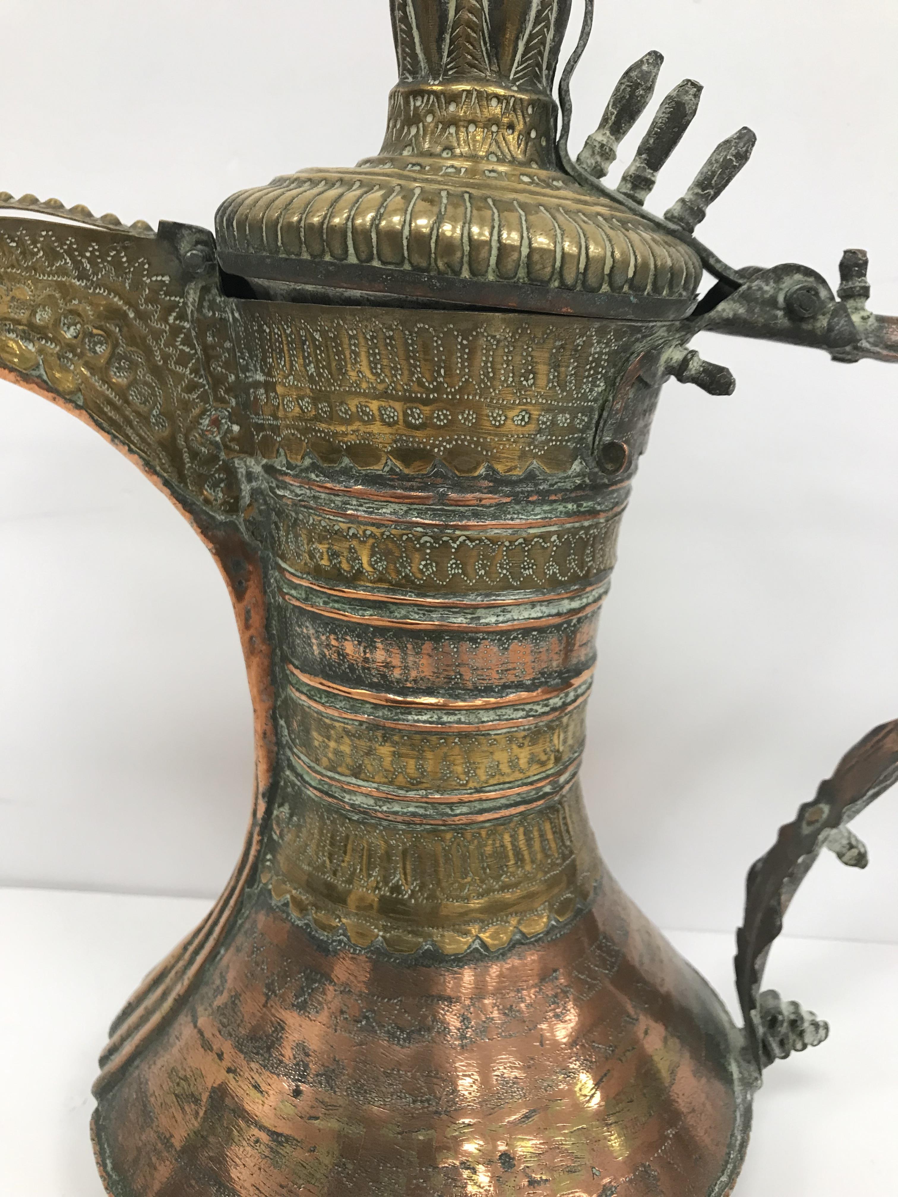 A collection of Middle Eastern and other copper wares to include two Turkish coffee pots, - Image 23 of 115