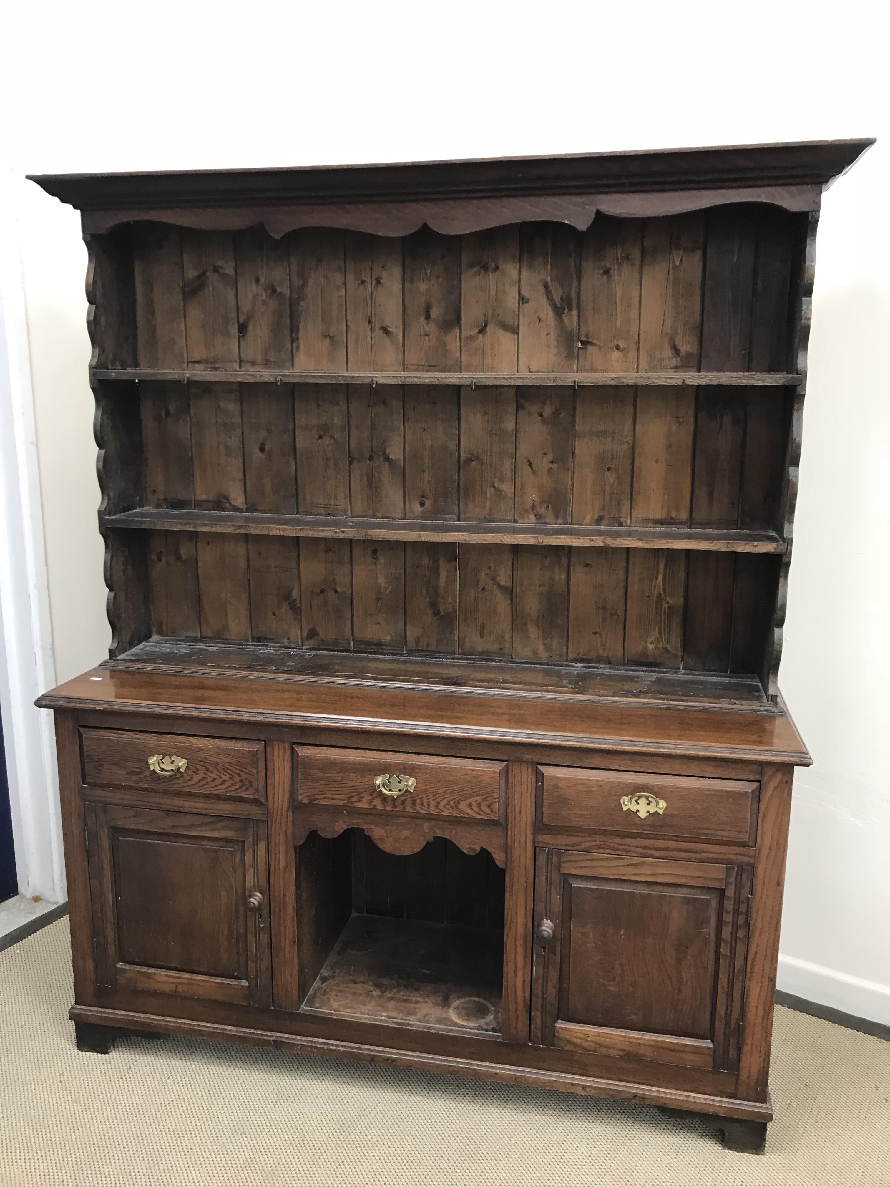 A 20th Century oak dresser in the 18th C