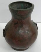 An early Chinese patinated bronze balust