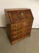 A modern yew wood bureau with fall front