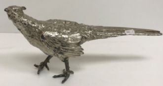 A silver plated model of a Cock Pheasant