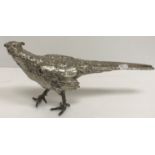 A silver plated model of a Cock Pheasant