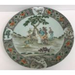 A Kangxi porcelain charger decorated wit