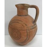 A Cypriot Iron Age terracotta flagon wit