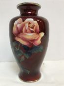 A 20th Century red ground cloisonne vase