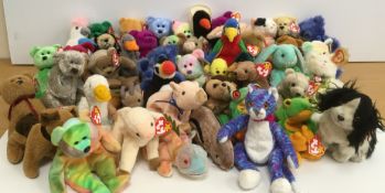 A box containing various Ty Beanie Babie