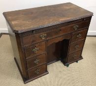 A 19th Century mahogany kneehole desk, t