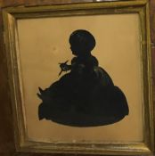 19TH CENTURY ENGLISH SCHOOL "Young child seated upon a cushion", silhouette study with highlighting,