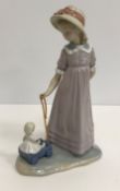 A Lladro figure of The Lamplighter (5205