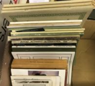 A box containing various catalogues for