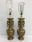 A pair of 20th Century brass table lamps