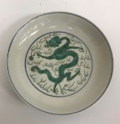 A Chinese famille verte dragon bowl bear