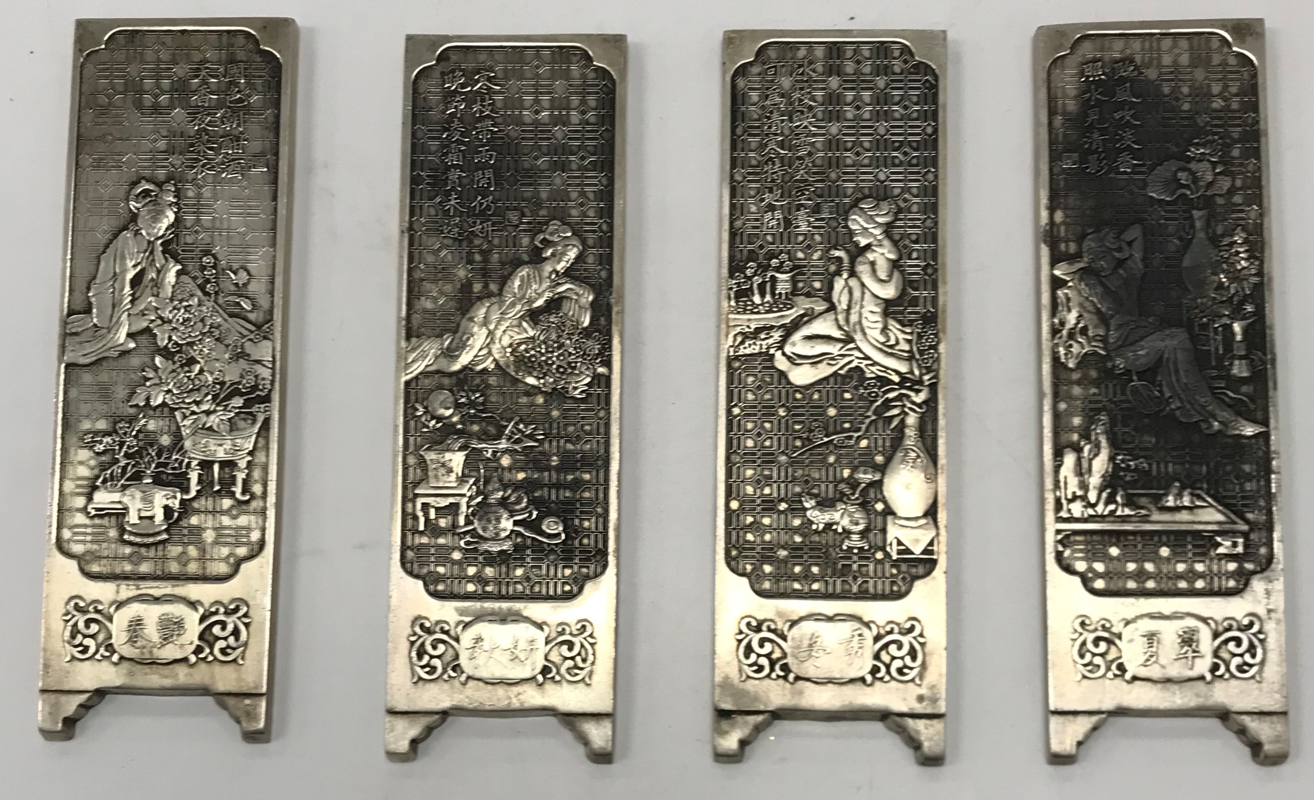 A set of four Chinese white metal cast m