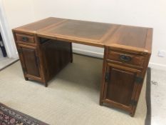 A 20th Century Chinese walnut desk, the