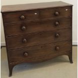 A Victorian mahogany square front chest of two short over three long graduated drawers with turned