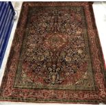 A fine Kashan silk rug,