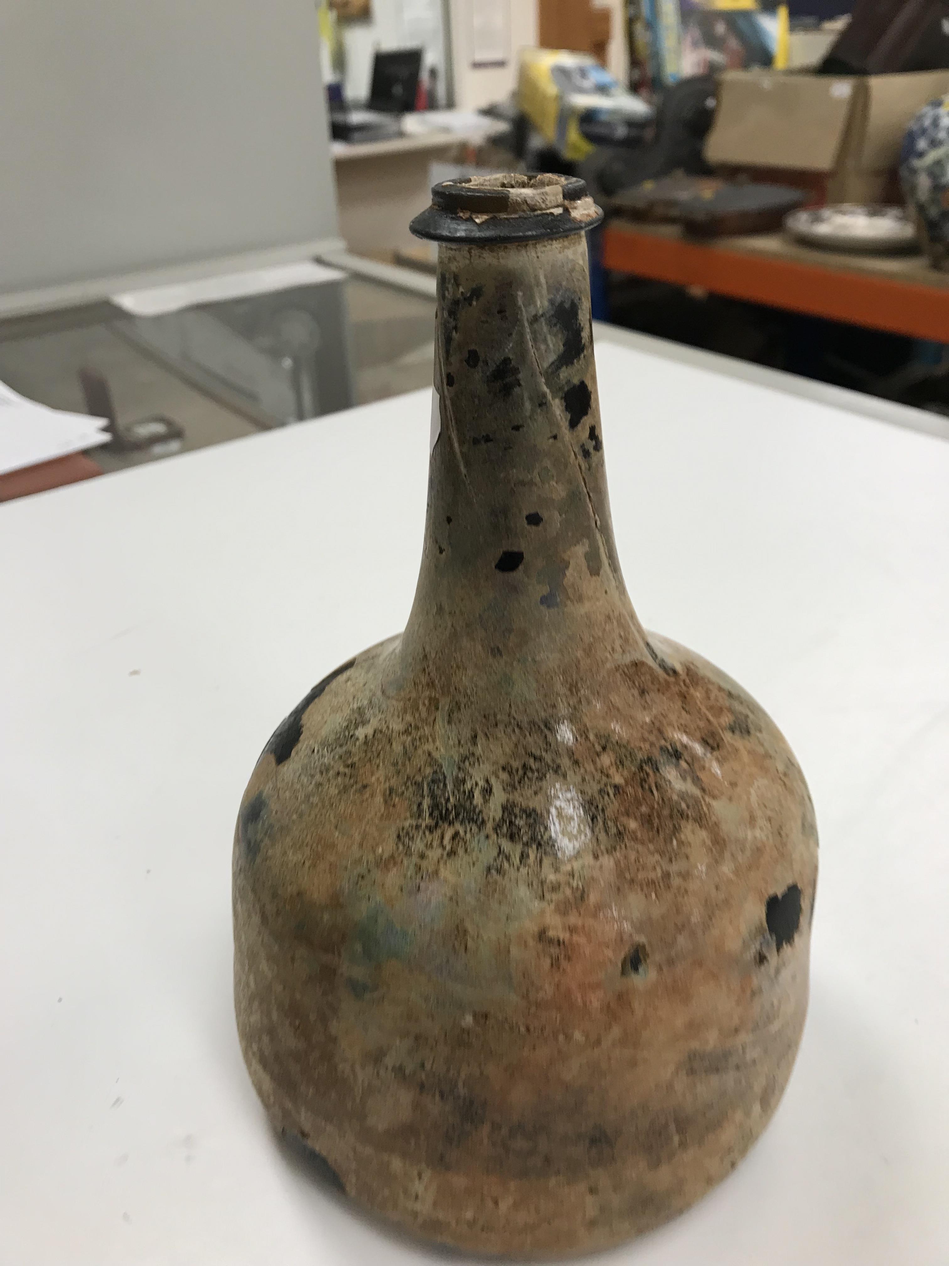 A mid 18th Century English black glass mallet-shaped wine bottle, - Image 4 of 33