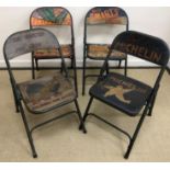A collection of four painted metal folding chairs in the vintage style