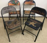 A collection of four painted metal folding chairs in the vintage style