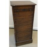 An early 20th Century oak tambour fronted filing cabinet,