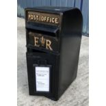 A modern reproduction ER postbox in black,