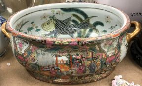 A modern Chinese famille-rose foot bath with gilt handles, 55 cm long x 21 cm high,