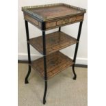 A circa 1900 French walnut and marquetry three tier étagère with galleried top and single drawer,