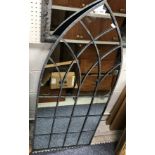 A modern Gothic style wall mirror, 51.