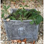 A pair of lead planters with lion mask decoration and two Belfast sinks,