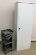 A painted metal single door cupboard with adjustable shelves, 61 cm wide x 46 cm deep x 181 cm high,