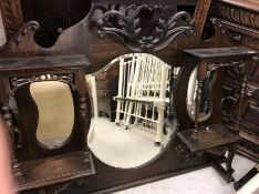 A Victorian mahogany mirror (formerly off a mirror back sideboard) with two shelves either side of