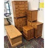 A collection of modern pine furniture comprising a pair of three drawer bedside cabinets,