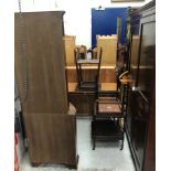 A large collection of furniture to include a mahogany two door wardrobe,