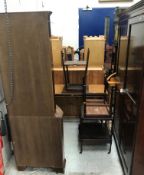 A large collection of furniture to include a mahogany two door wardrobe,
