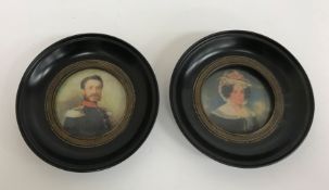 A pair of modern prints as 19th Century miniatures in black frames, 14.