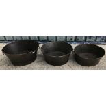 A set of three graduated vintage style metal oval planters,