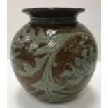 A late 19th Century Martin Brothers pottery vase with foliate decoration,