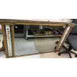 A 19th Century overmantel mirror with gilt and gesso decoration,
