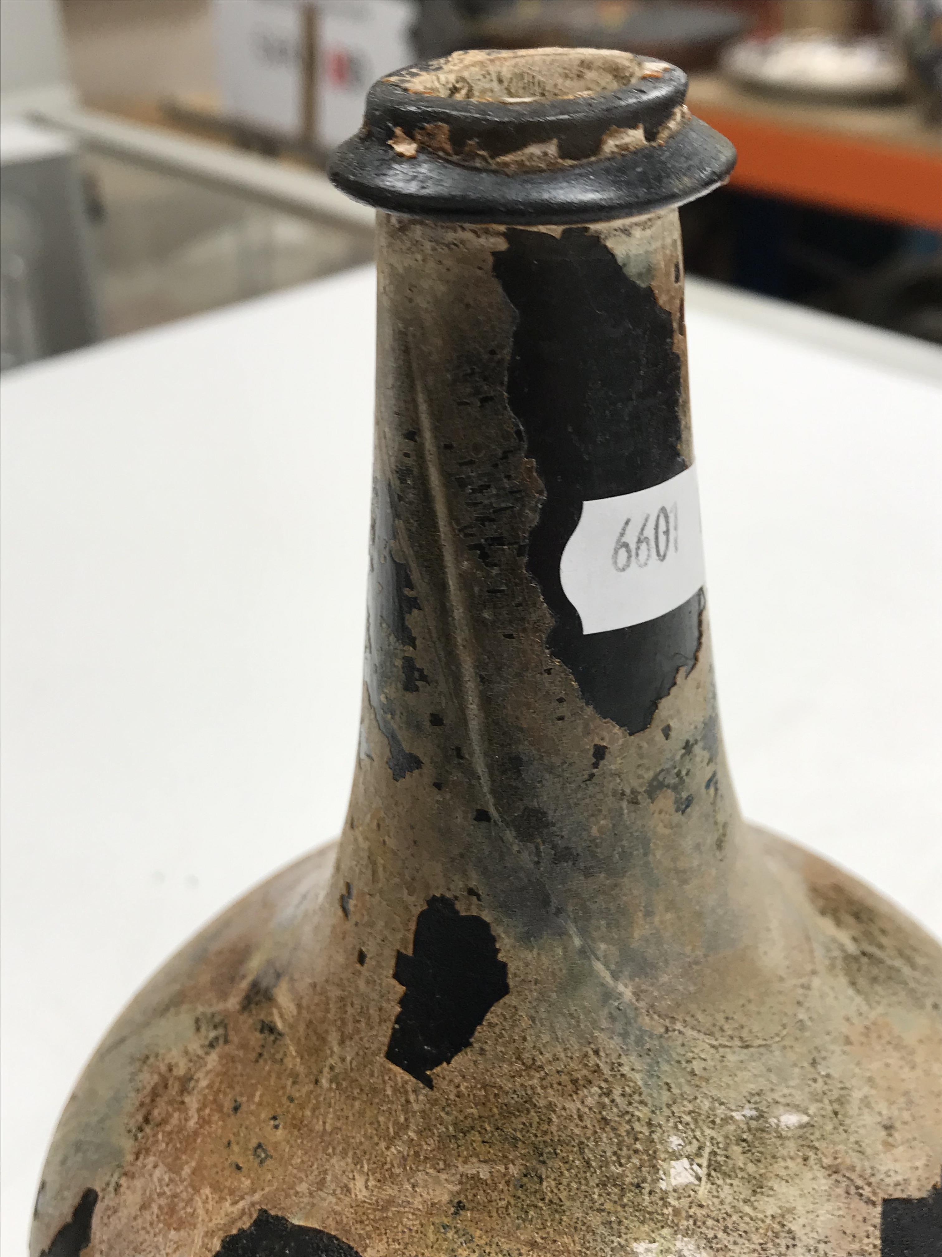 A mid 18th Century English black glass mallet-shaped wine bottle, - Image 8 of 33