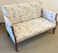An Edwardian mahogany and inlaid two seat salon sofa on square tapered legs to castors,