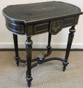 A 20th Century ebonised and brass inlaid single drawer side table in the Louis Philippe taste,