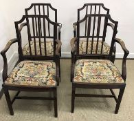 A set of four early 20th Century mahogany elbow dining chairs, 92.