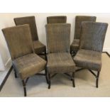 A matched set of five Lusty caned dining chairs and a similar Lloyd Loom chair,