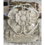 A pair of composite stone corbels with rose head decoration, one approx 40 cm x 19 cm x 35 cm,